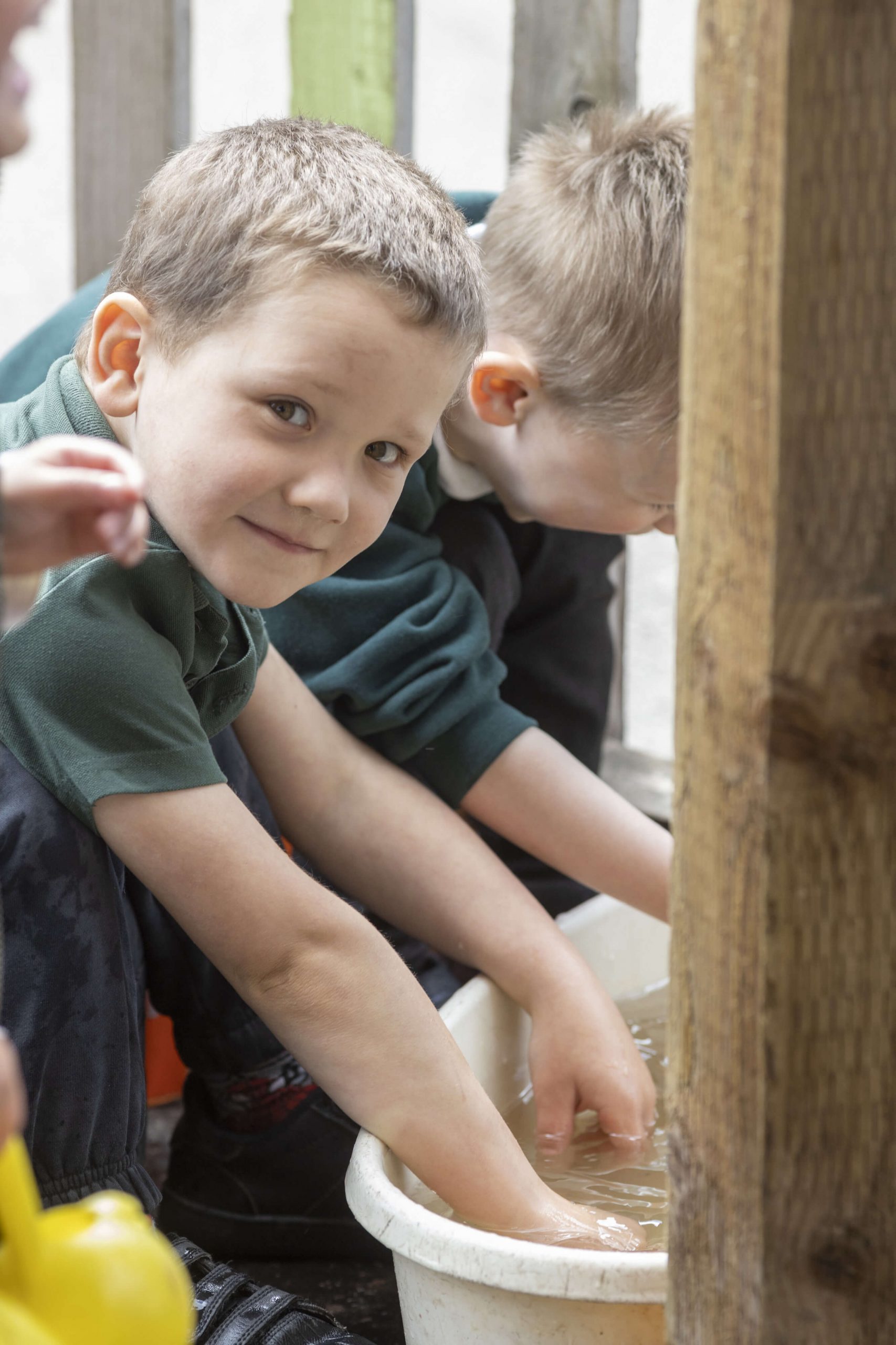 photo of pupils playing with water