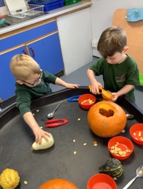 EYFS children learning about the past through enjoying celebrations and exploring changes around them.