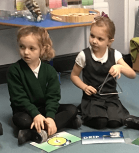 Photo of an EYFS pupils in a music lesson