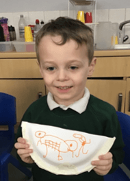 Photo of an EYFS pupils in a music lesson